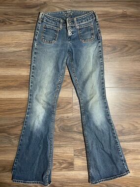 Silver Jeans Women's Flared Denim in Faded Blue Wash